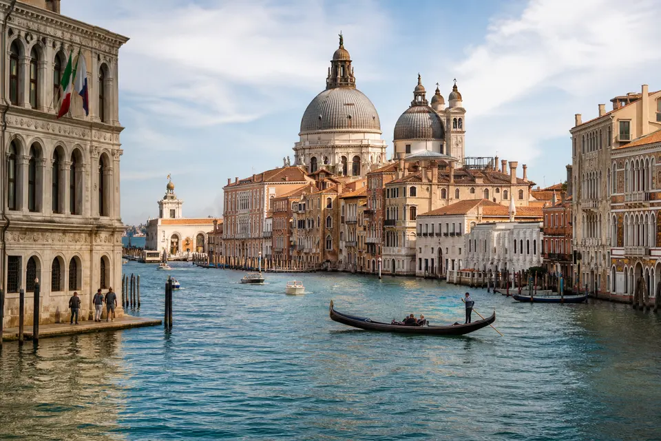 AI-generated illustration of a gondola on the Grand Canal beside Venetian architecture